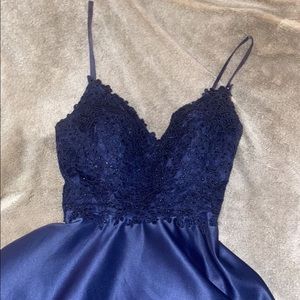 A navy blue homecoming semi formal dress